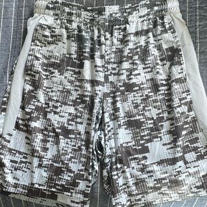 A pair of Tek Gear shorts size small. Color of shorts is White and Gray.